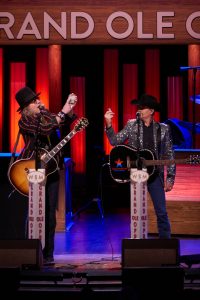 Big and Rich proclaim their favorite card is the 9 of hearts at the Grand ol' Oprey