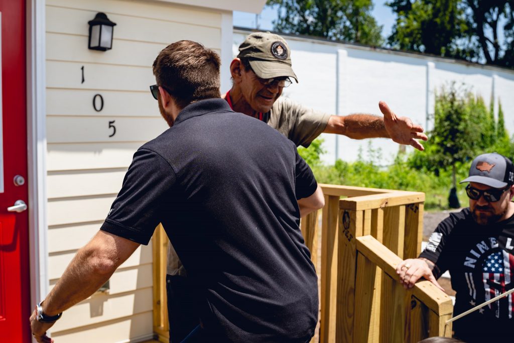 Tyler Merritt visits the Veteran tiny home village, an initiative of the Nine Line Foundation